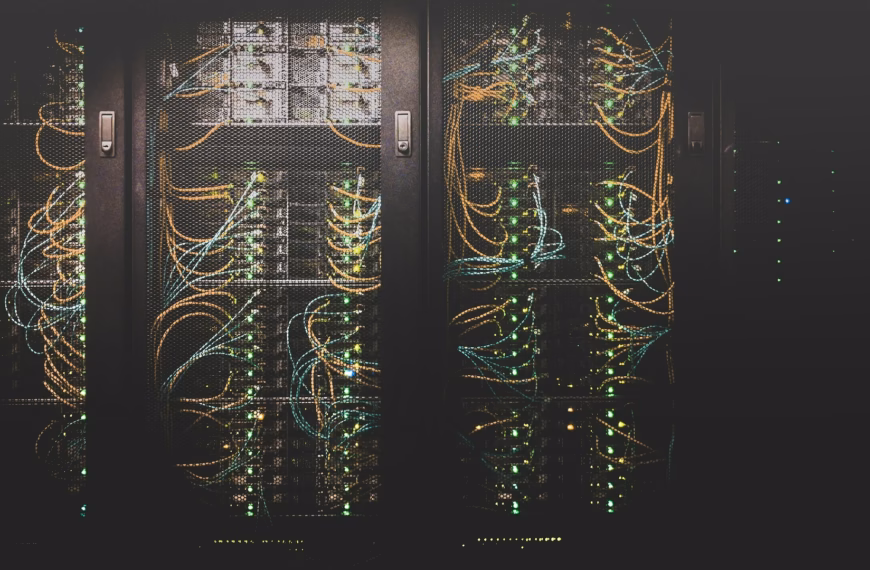 Data center server racks with network cabling, illustrating the OpenAI Nvidia Ohio data center deal