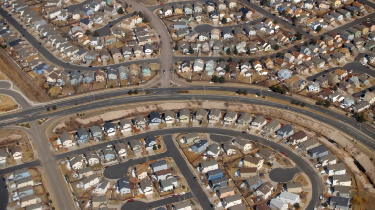 Rows of near-identical suburban houses in Colorado Springs, the uniform housing stock a pricing algorithm like the one behind Zillow Offers is built to value
