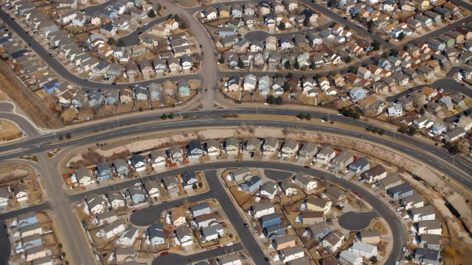 Rows of near-identical suburban houses in Colorado Springs, the uniform housing stock a pricing algorithm like the one behind Zillow Offers is built to value