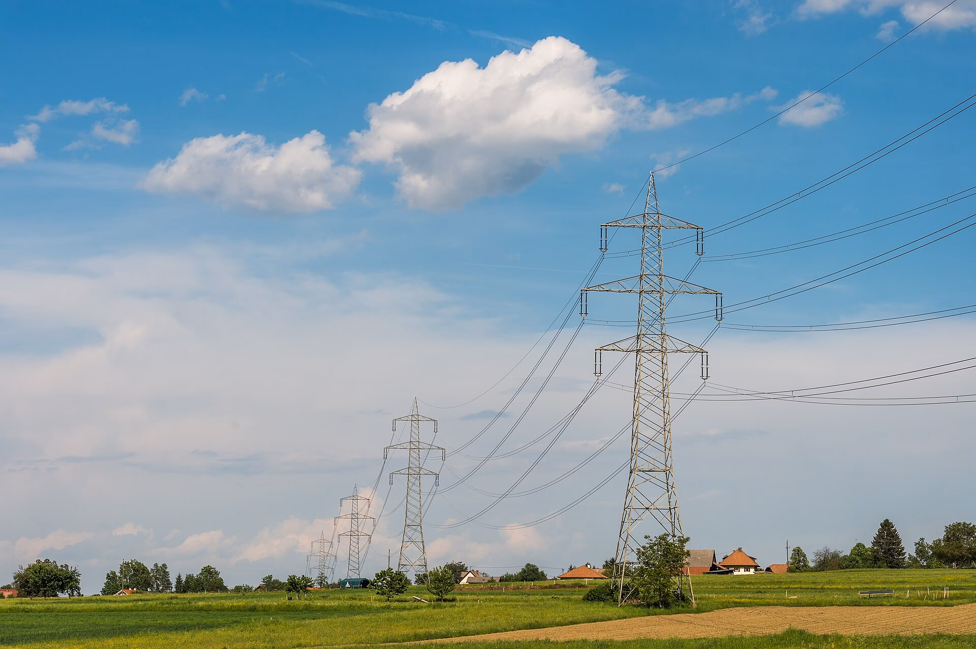 High-voltage transmission lines and pylons of the European interconnected grid at Radendorf, Arnoldstein, Austria