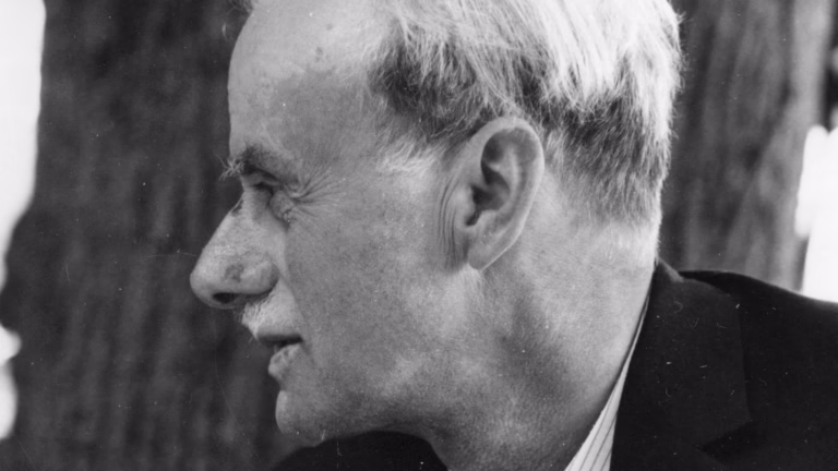 Black and white profile portrait of the physicist Paul Dirac, photographed outdoors in Lindau, Germany, in 1961