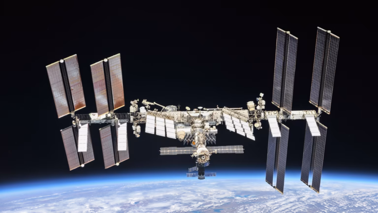 The International Space Station above the curve of the Earth, photographed by the Expedition 56 crew from their departing Soyuz spacecraft in October 2018