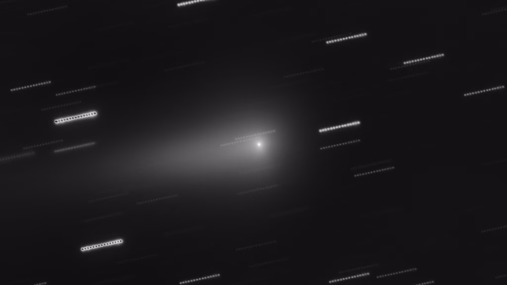 Interstellar comet 3I/ATLAS imaged by ESO's Very Large Telescope in January 2026: a bright nucleus with a faint tail, background stars drawn into short trails