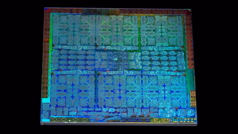 Die photograph of an Nvidia TU104 graphics processor from a GeForce RTX 2080, showing the repeating blocks of its streaming multiprocessors